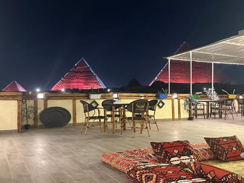 Restaurant/places to eat, Night, Banquet/Function facilities, Seating area, Landmark view