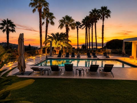 Patio, Natural landscape, Pool view, Swimming pool, Sunset, sunbed