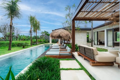 Property building, Living room, Seating area, Pool view, Swimming pool, internet, sunbed