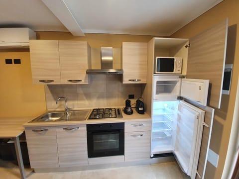 Kitchen or kitchenette, stove