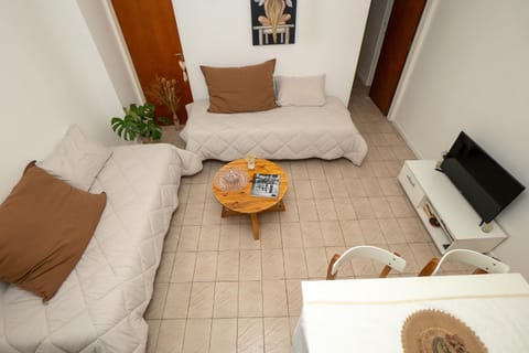 Bed, TV and multimedia, Living room, Seating area, Dining area