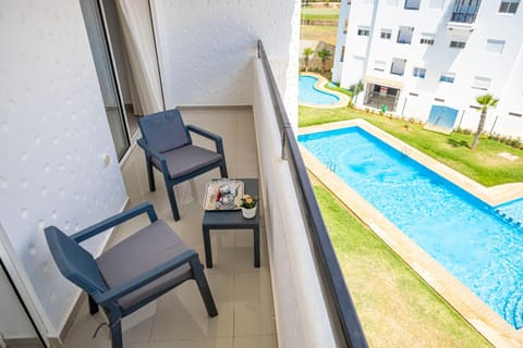 Balcony/Terrace, Seating area, Pool view