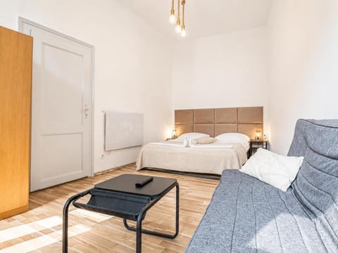 Property building, Bed, Seating area, Bedroom