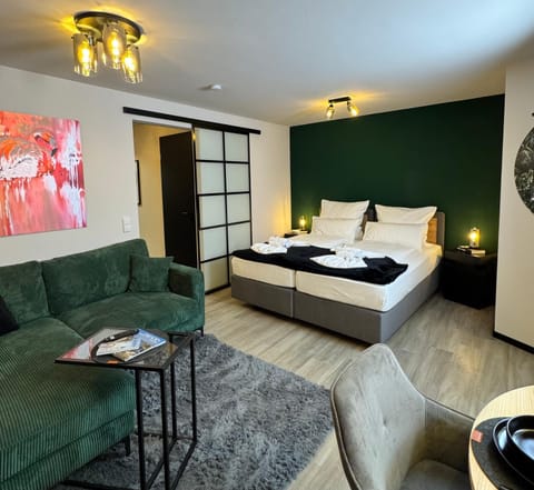 Bed, Living room, Photo of the whole room, Seating area, Bedroom, towels