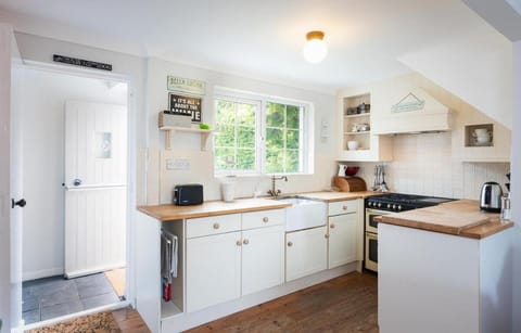 Kitchen or kitchenette, oven, stove, toaster