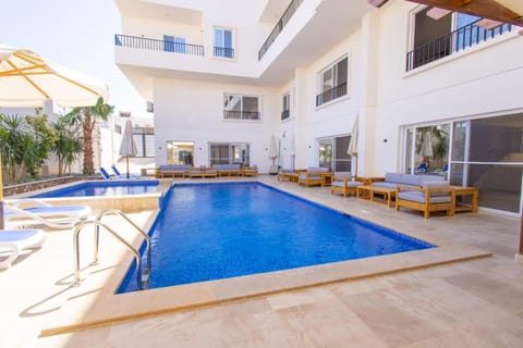 Property building, Patio, Day, View (from property/room), Balcony/Terrace, Pool view, Swimming pool, sunbed