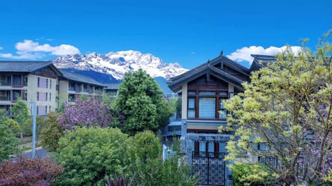 Property building, Nearby landmark, Spring, Day, Natural landscape, Mountain view