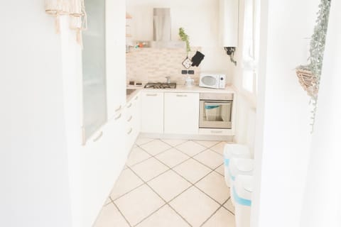 Kitchen or kitchenette, oven, stove