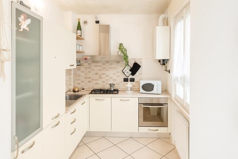 Kitchen or kitchenette, oven, stove
