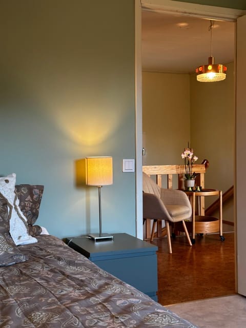 Bed, Seating area, Bedroom