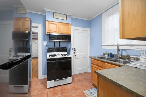 Kitchen or kitchenette, oven, stove