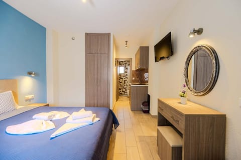 Bed, TV and multimedia, Living room, Photo of the whole room, Seating area, Bedroom, hair dresser, wardrobe