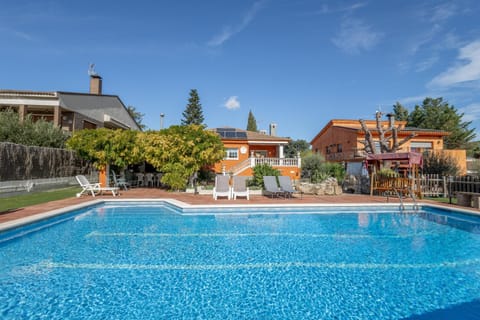 Property building, Living room, Swimming pool