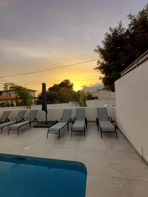 Swimming pool, Sunset, sunbed