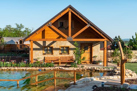 Property building, Natural landscape, Lake view, Pool view