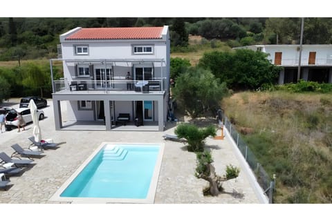 Property building, Living room, Swimming pool