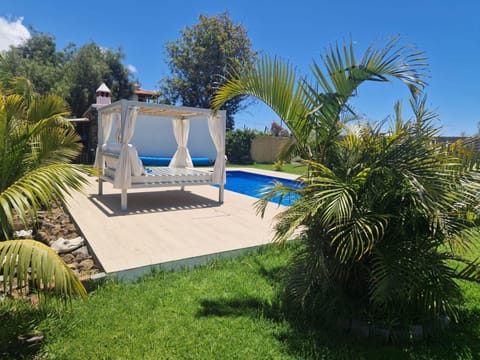Property building, Living room, Swimming pool