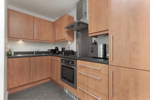 Kitchen or kitchenette, oven, stove, toaster