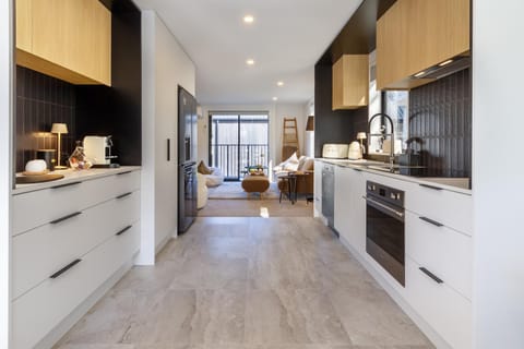 Kitchen or kitchenette, dishwasher, stove