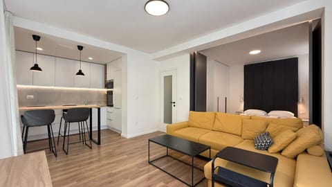 Kitchen or kitchenette, Living room, Seating area, Dining area