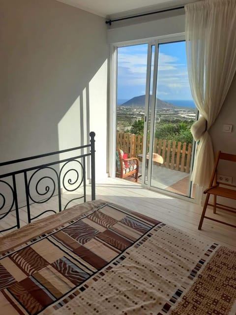 Bed, Natural landscape, View (from property/room), Bedroom, Mountain view, Sea view