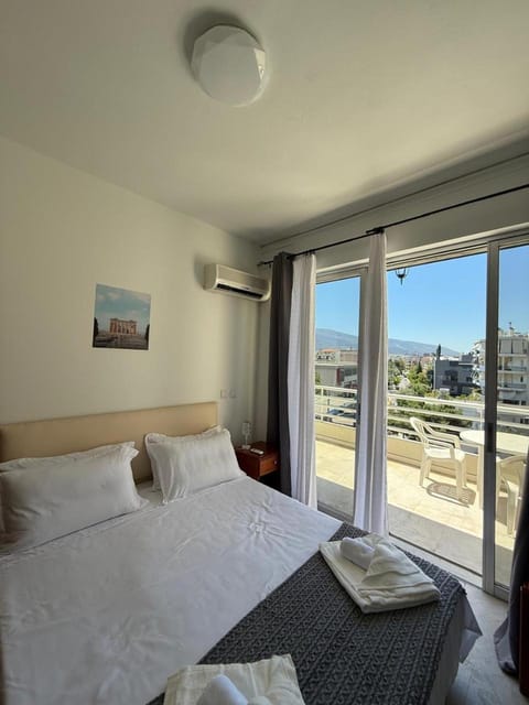 Bed, View (from property/room), Balcony/Terrace, Photo of the whole room, Mountain view, towels, air conditioner