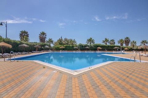 Property building, Living room, Swimming pool