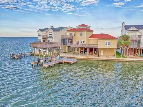 Jaw-dropping bayfront home with panoramic water views, boat slip, and cowboy pool House in Galveston Island