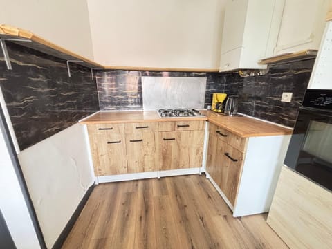 Kitchen or kitchenette, stove