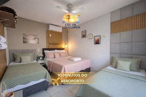 Bed, Property logo or sign, Photo of the whole room, Logo/Certificate/Sign, Bedroom, towels, air conditioner