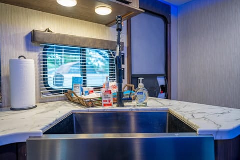 The Backyard Glampground - Camper Fire Pit & Games Campground/
RV Resort in Tampa