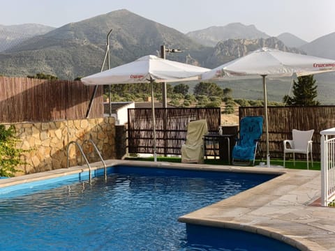Property building, Living room, Swimming pool