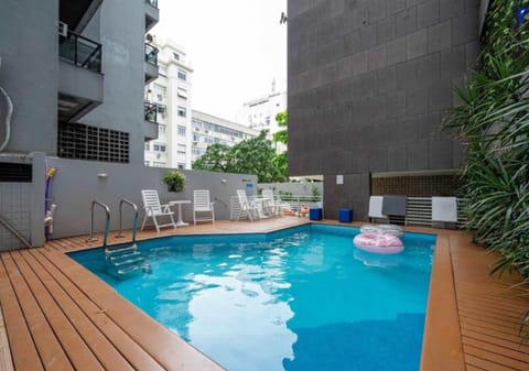 Property building, Patio, Day, Pool view, Swimming pool