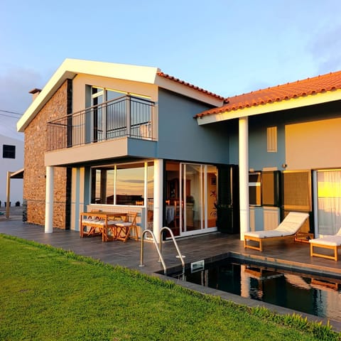 Property building, Swimming pool, Sunset, sunbed