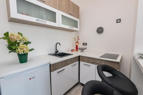 Kitchen or kitchenette, stove