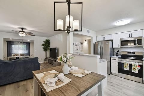 Kitchen or kitchenette, dishwasher, oven, stove