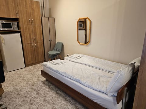 Bed, Kitchen or kitchenette, wardrobe