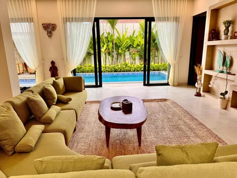 TV and multimedia, Living room, Seating area, Pool view, Swimming pool