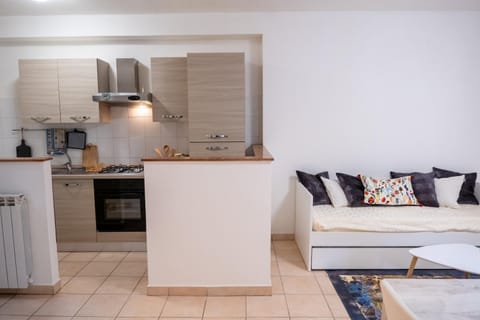 Kitchen or kitchenette, Living room, Seating area, stove