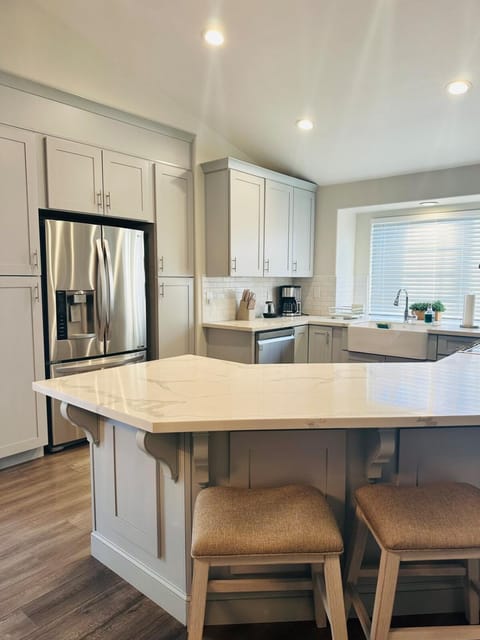 Kitchen or kitchenette, dishwasher, oven, stove