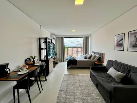 Bed, View (from property/room), Living room, Seating area, Dining area