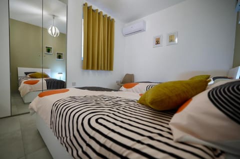 Bedroom, towels, air conditioner