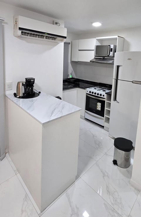 Kitchen or kitchenette, oven, air conditioner