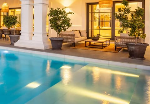 Patio, Natural landscape, Seating area, Pool view, Swimming pool, sunbed