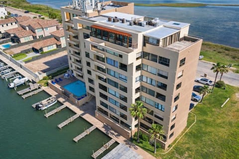 Channel Front with Pool Hot Tub Patio Apartment in South Padre Island