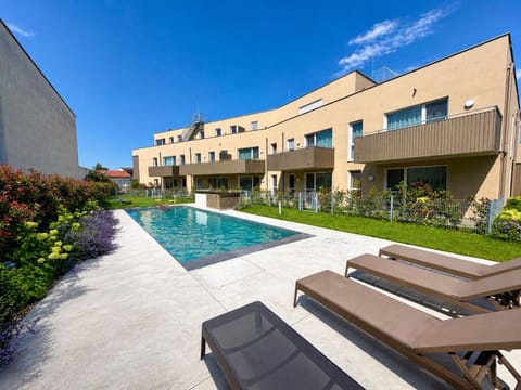 Property building, Day, Pool view, Swimming pool