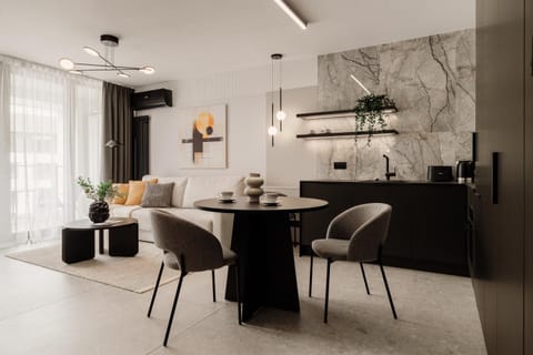 Kitchen or kitchenette, Living room, Seating area, Dining area