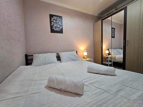 Bed, Photo of the whole room, Bedroom, towels, wardrobe