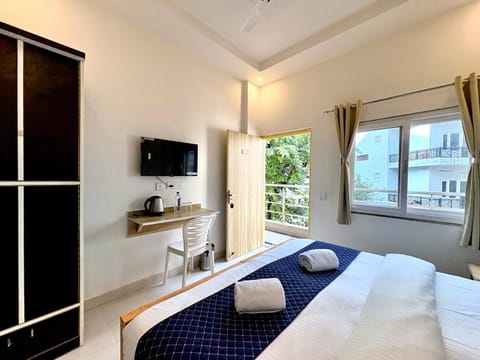 Coffee/tea facilities, Bedroom, City view