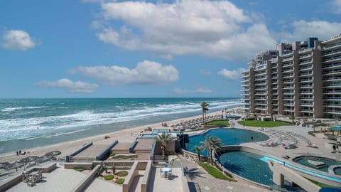Property building, Day, Beach, Pool view, Sea view, Swimming pool, sunbed